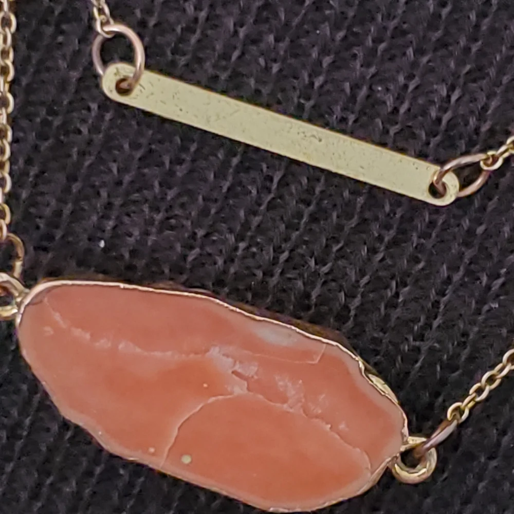 Copper tone two strand necklace with salmon colored marble look stone